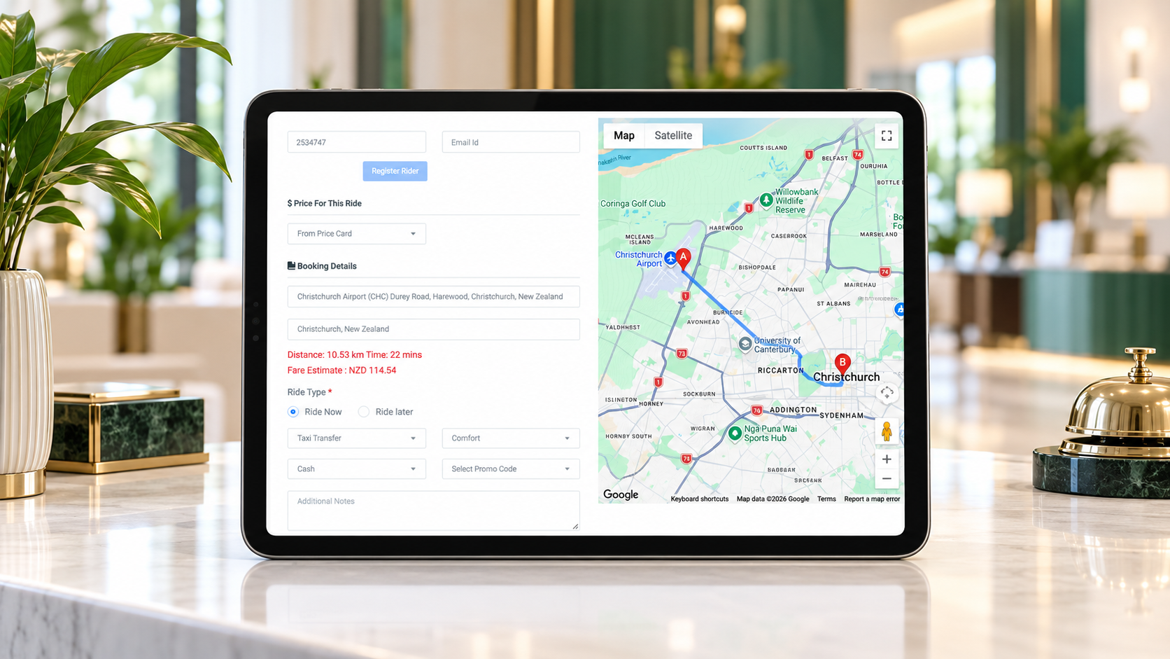 Reception tablet displaying a taxi booking form beside a journey map.